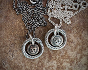 ouroboros surrounding skull necklace charm - mixed metal memento mori
