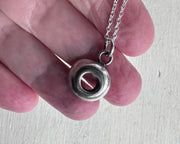 puka shell necklace pendant in sterling silver