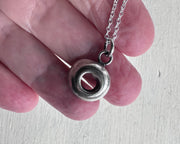 puka shell necklace pendant in sterling silver - organic spiral jewelry