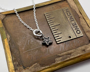 tiny bronze star necklace