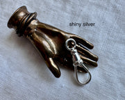 shiny silver dog clip