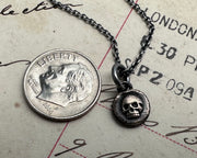 bronze skull pendant
