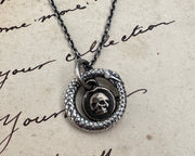 ouroboros and skull necklace