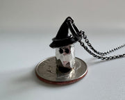 ghost pendant on a dime