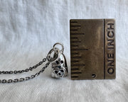Desdemona the ghost necklace charm - ghost holding a skull heart