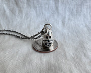 Desdemona the ghost necklace charm - ghost holding a skull heart