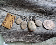 beach pebble necklace pendant in mixed metals - sterling silver and bronze