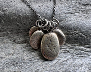 beach pebble necklace pendant in mixed metals - sterling silver and bronze