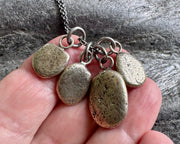 beach pebble necklace pendant in mixed metals - sterling silver and bronze