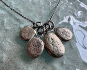 beach pebble necklace pendant in mixed metals - sterling silver and bronze