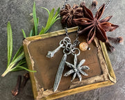 Love Potion Number Nine charm necklace - with star anise, rosemary leaf, clove bud charms