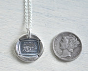 cannon wax seal necklace