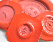 skull and crossbones wax seal impression