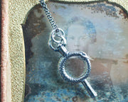 ouroboros watch key necklace charm