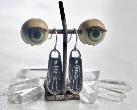 skeketon earrings