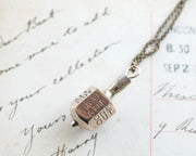 put and take spinner pendant
