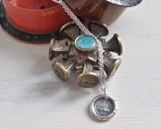 clasped hands wax seal pendant