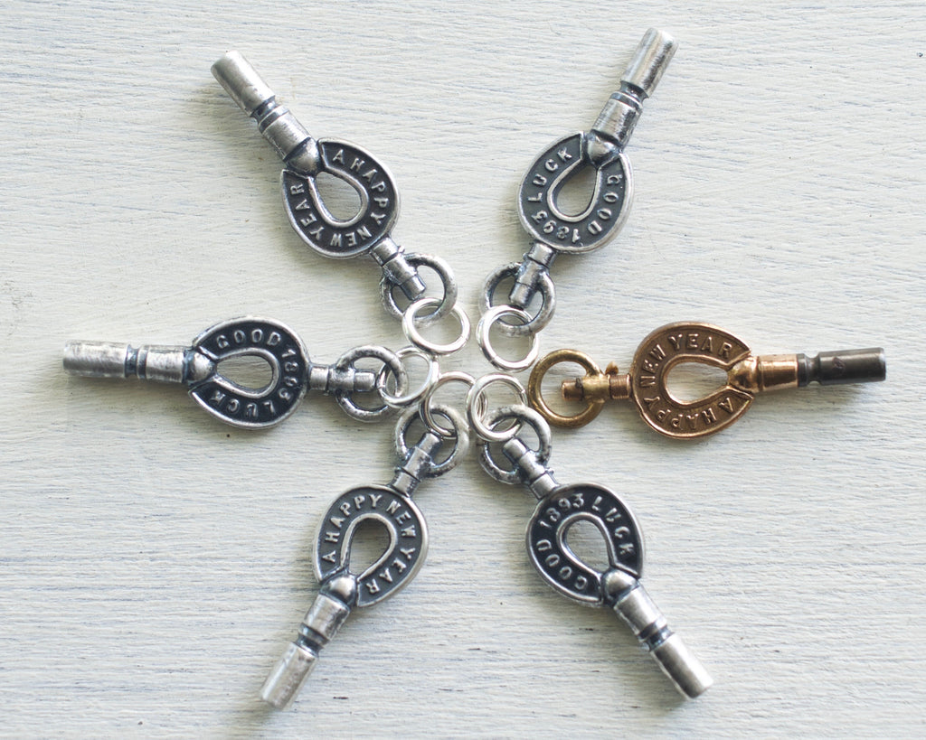 horseshoe watch winder key