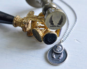 skull and wings necklace