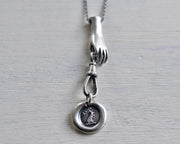 hand charm catcher