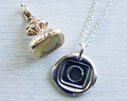 ouroboros wax seal jewelry