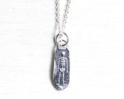 skeleton pendant