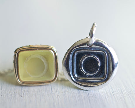 ouroboros wax seal necklace