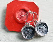 skull wax seal earrings