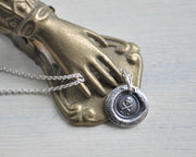 skull wax seal necklace