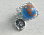 two hearts above the world