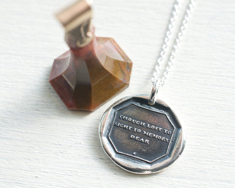 though lost to sight pendant