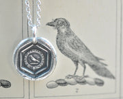 raven wax seal necklace