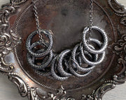 ouroboroses necklace