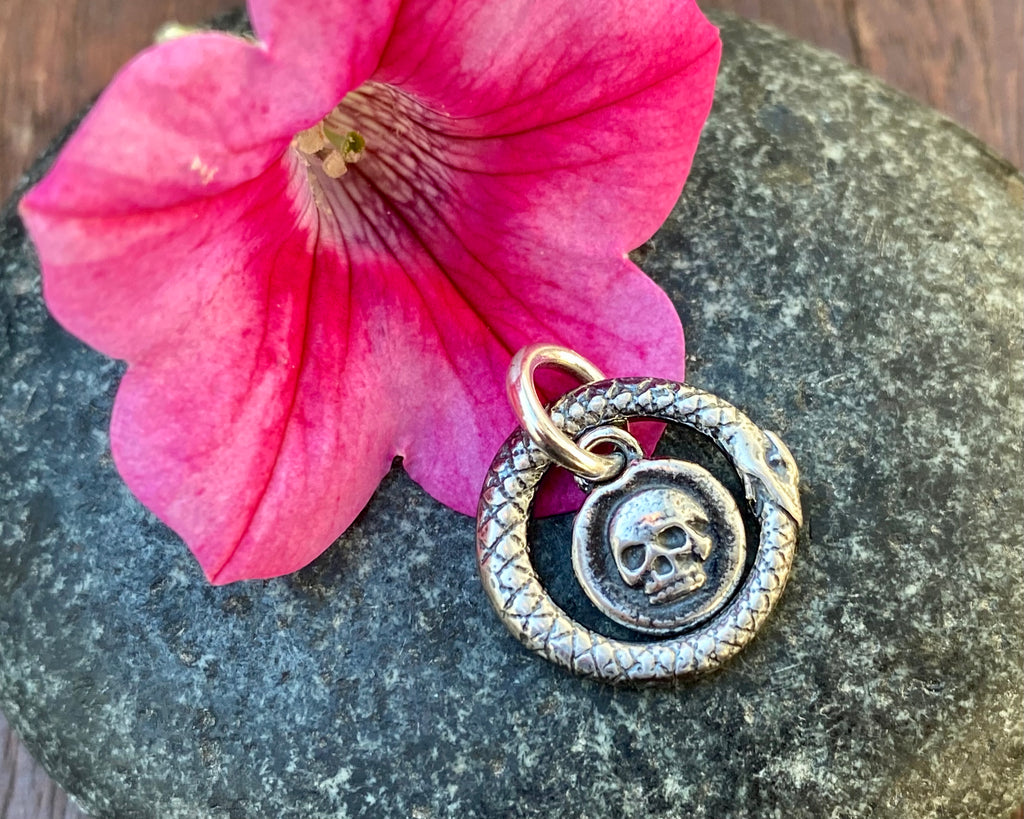 ouroboros snake and skull charm
