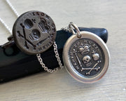 skull and bones wax seal necklace