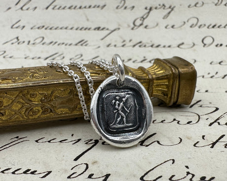 devil and cupid wax seal necklace