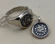 skull and bones wax seal jewelry