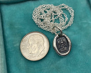 tiny phoenix pendant