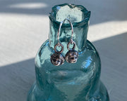 silver doll head earrings