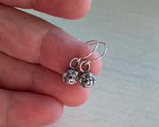 tiny doll head earrings