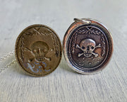 skull and bones wax seal necklace
