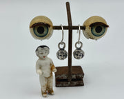 doll head earrings
