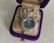 skull and crossbones wax seal pendant