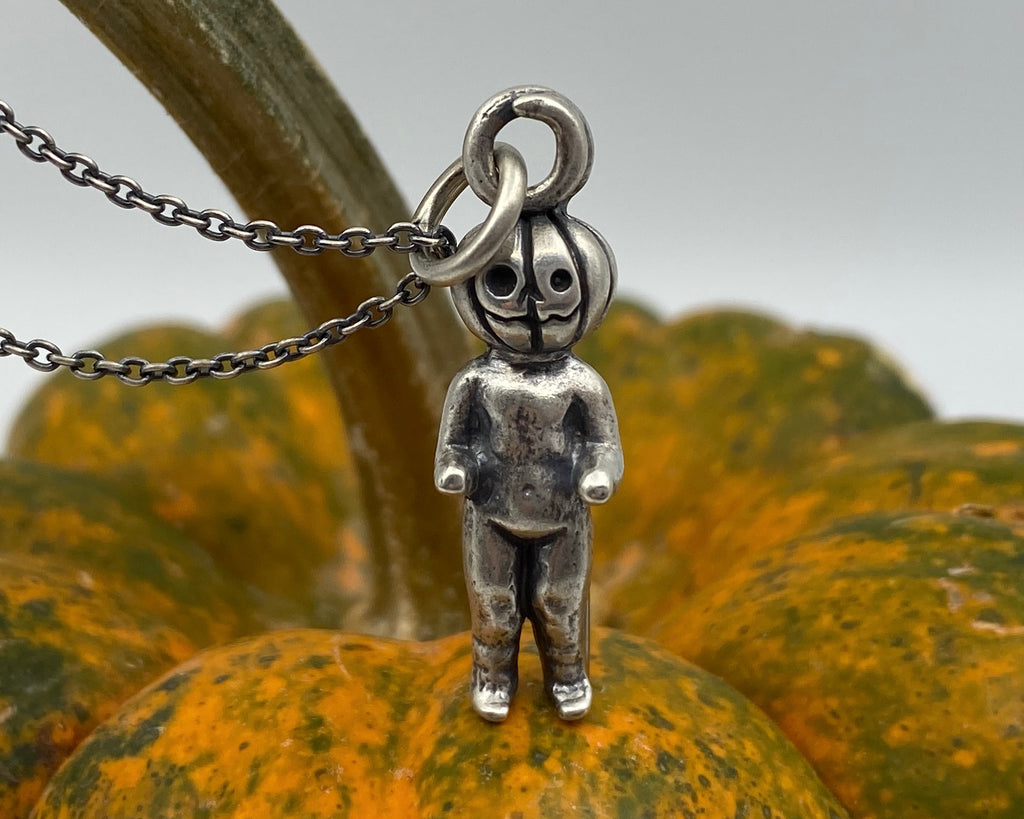 pumpkin head frozen charlotte pendant