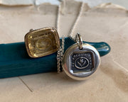 ouroboros wax seal jewelry