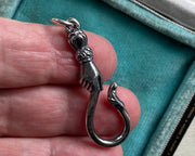 jewelry hook - hand holding serpent hook - snake hook - charm holder