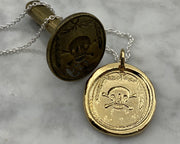 gold skull and bones wax seal necklace