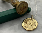 gold fleur de lis wax seal jewelry