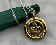 gold fleur de lis wax seal jewelry