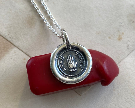 heart in hand wax seal necklace
